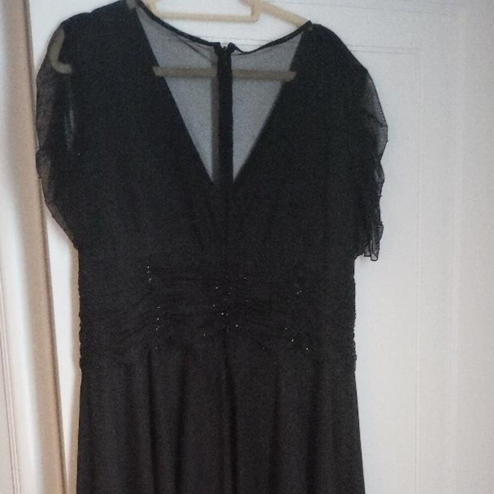 Knee length black formal dress